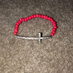 Pink cross bracelet